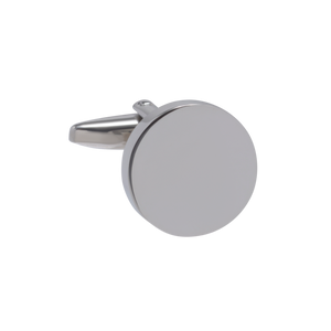Silver round cufflink on a white background